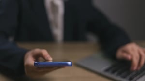 businessmen-use-smartphones-in-offices-with-copy-s-2025-02-15-21-31-31-utc