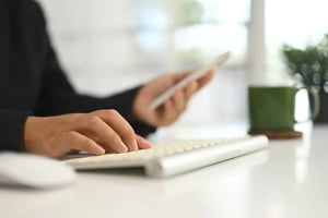 close-up-of-businesswoman-typing-computer-keyboard-2025-04-30-10-06-46-utc